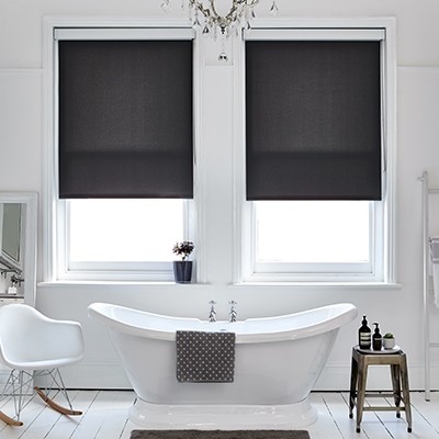 Two Black Premium Roller blinds side by side